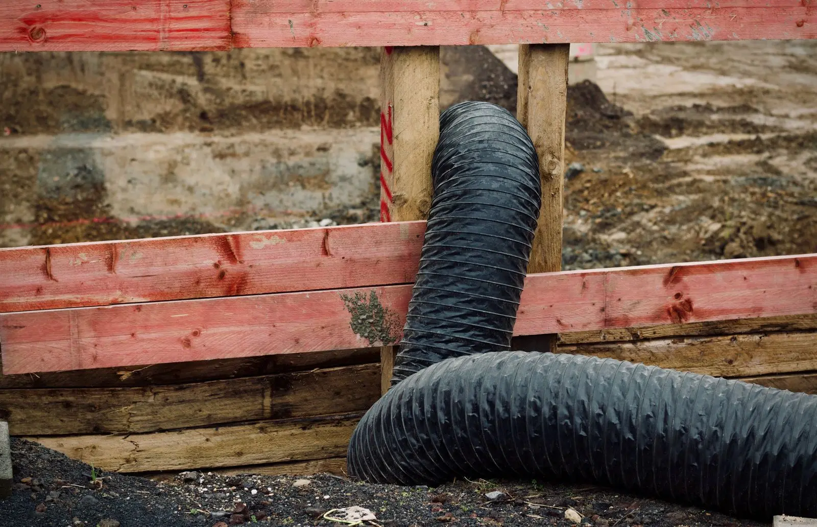 Before: Kinked and crushed flexible air duct