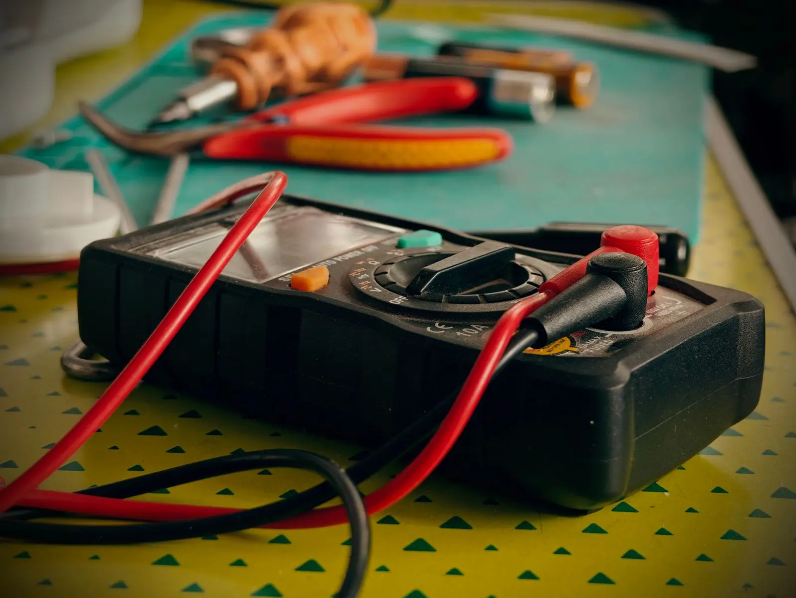Multimeter and test leads used for HVAC diagnostics