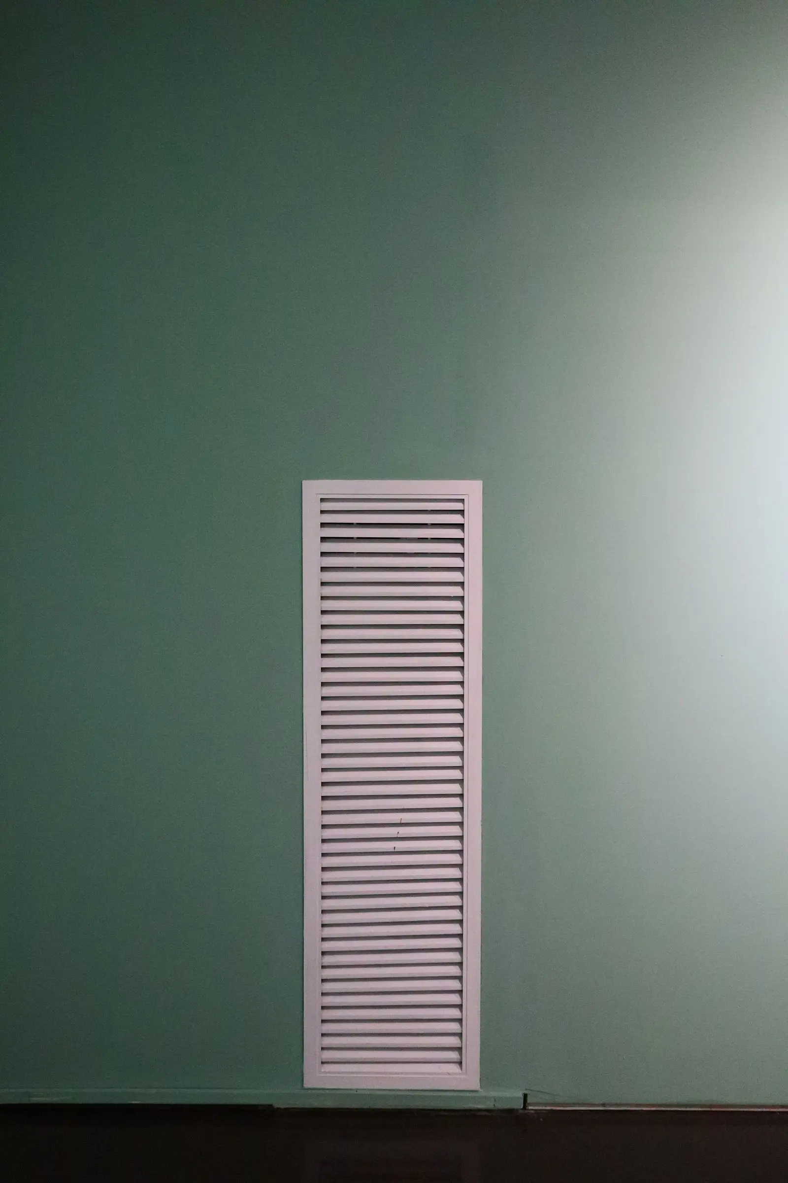 Return air vent grille on a wall