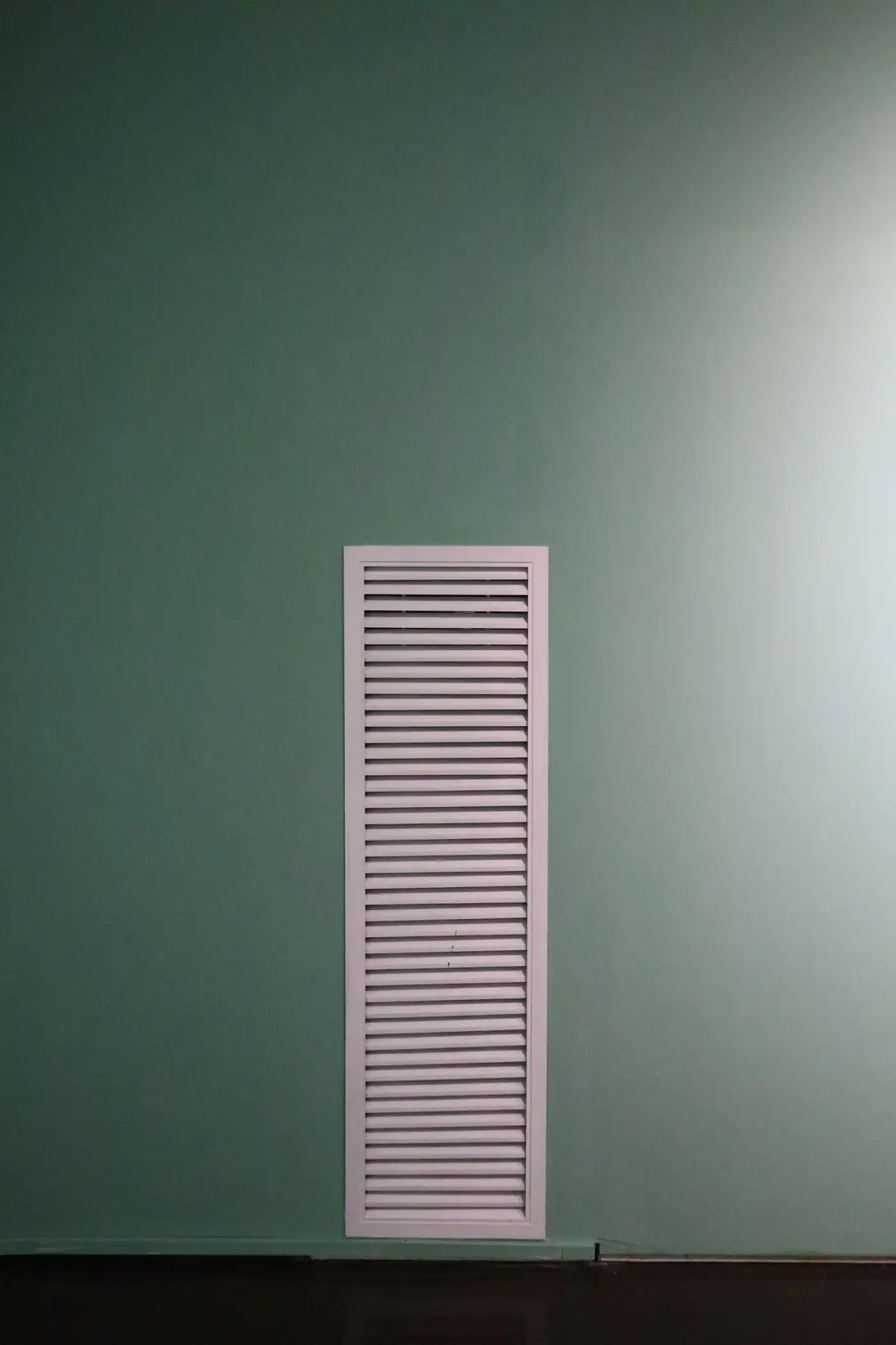 Return air vent grille on a wall